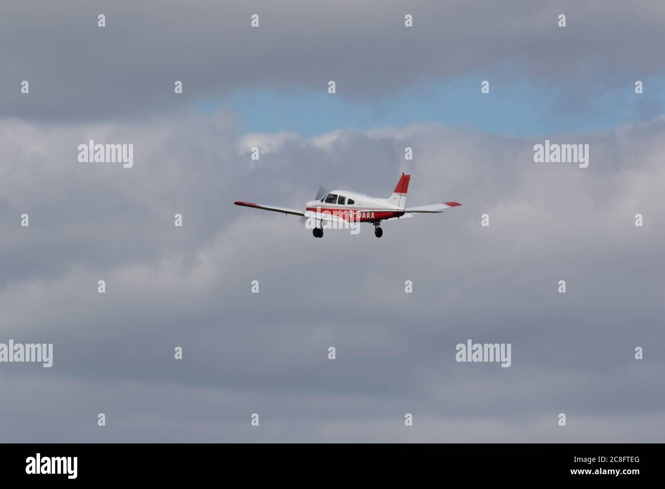 Single enginied light aircraft just after takeoff from Wolverhampton Halfpenny Green Airfield. Staffordshire. UK Stock Photo