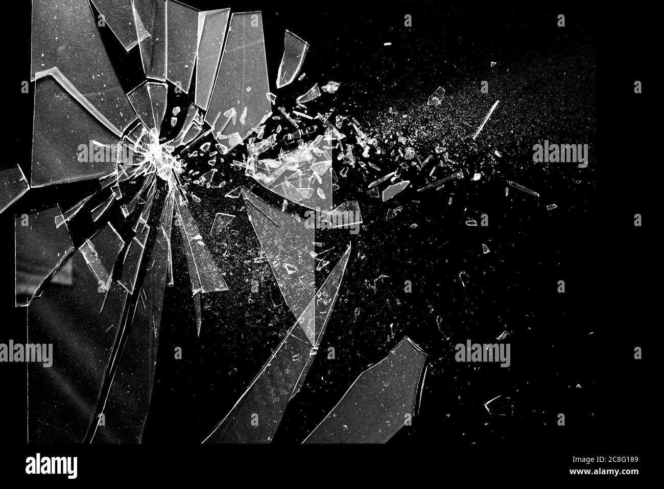 Broken glass on the black bachground. Texture of broken glass. Isolated