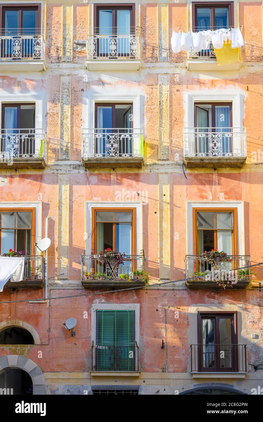 Windows and balconies of a residential apartment block in Amalfi, Italy Stock Photo