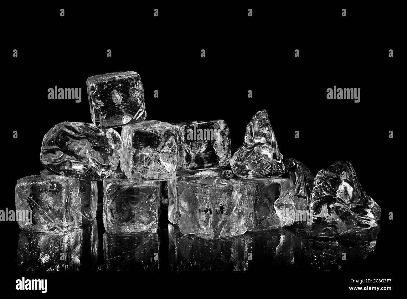 ice cubes with reflection on black background Stock Photo - Alamy