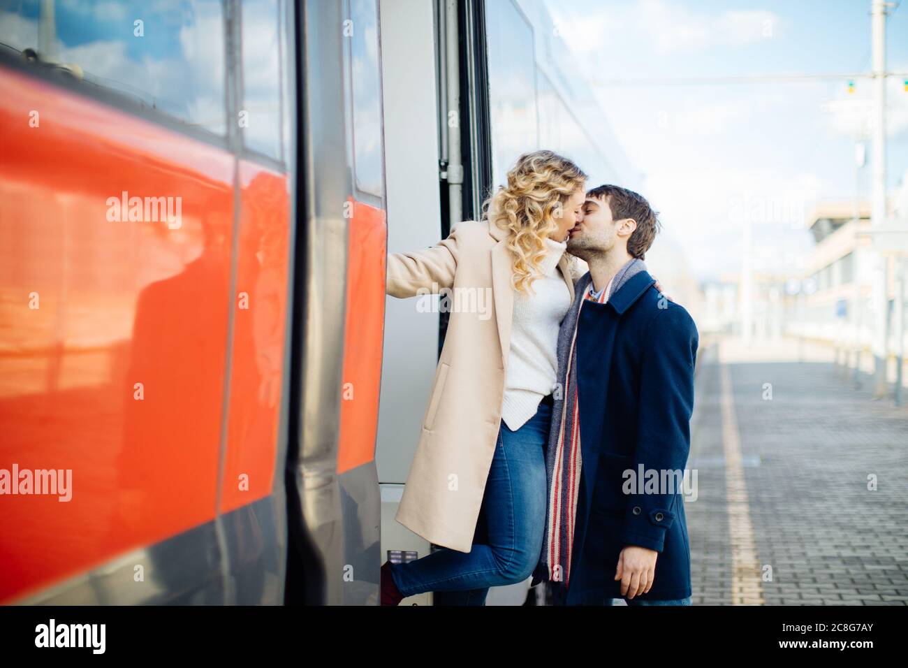 Couple kissing beside train, Firenze, Toscana, Italy Stock Photo