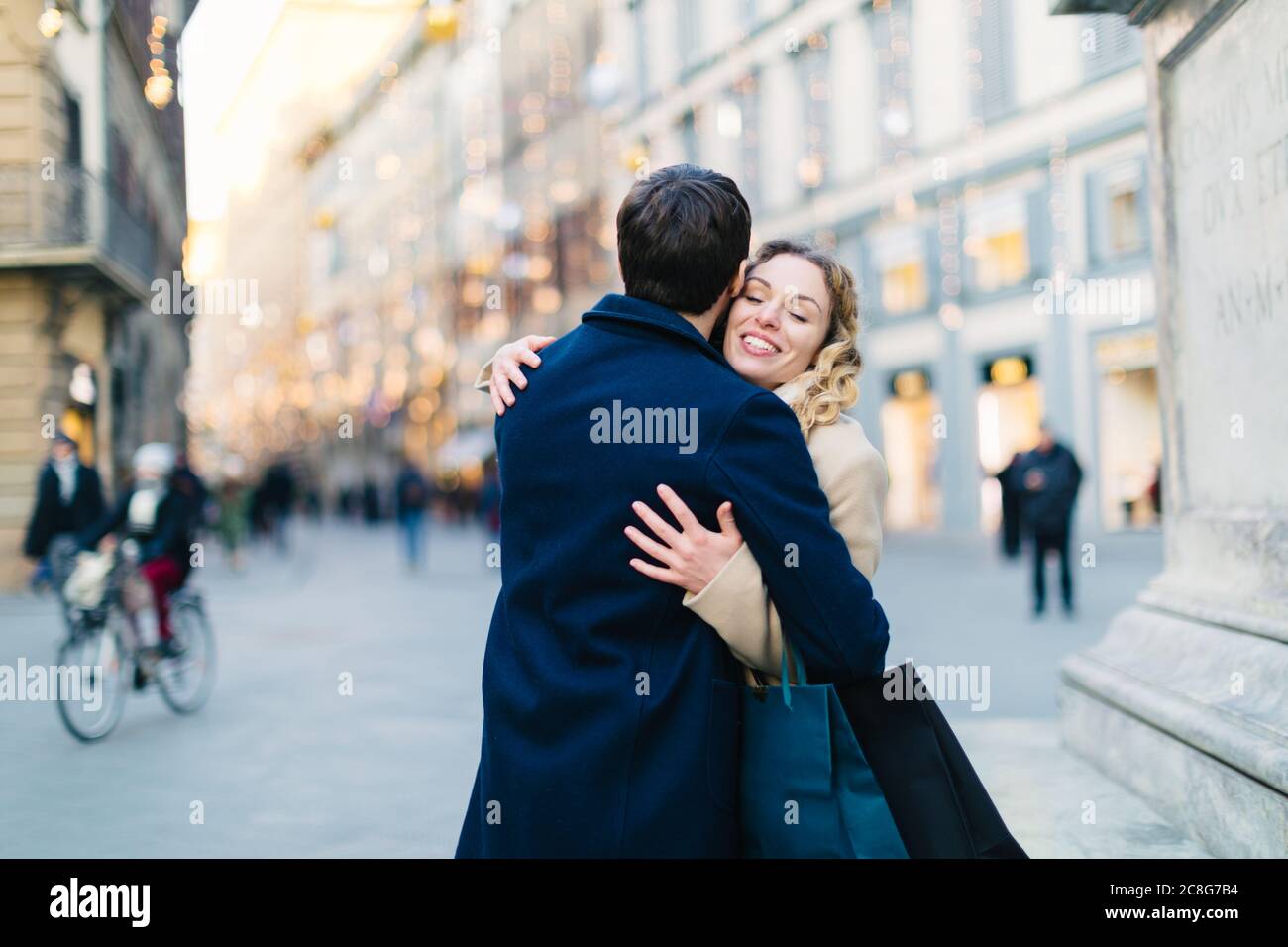 Couple hugging at piazza, Firenze, Toscana, Italy Stock Photo