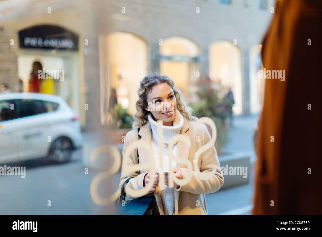 Woman window shopping, Firenze, Toscana, Italy Stock Photo