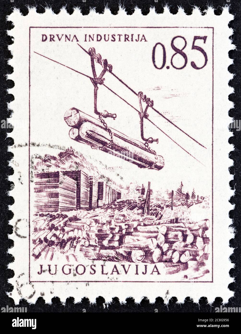 YUGOSLAVIA - CIRCA 1966: A stamp printed in Yugoslavia from the 'Engineering & Architecture' issue shows Timber industry, cable railway, circa 1966. Stock Photo