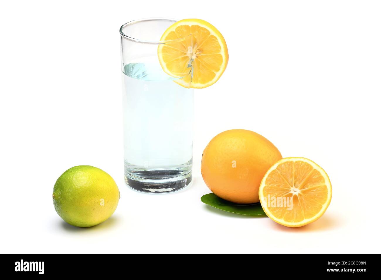 Fresh Water In Glass With Lemon. Fresh Meyer Lemons And Limes Isolated