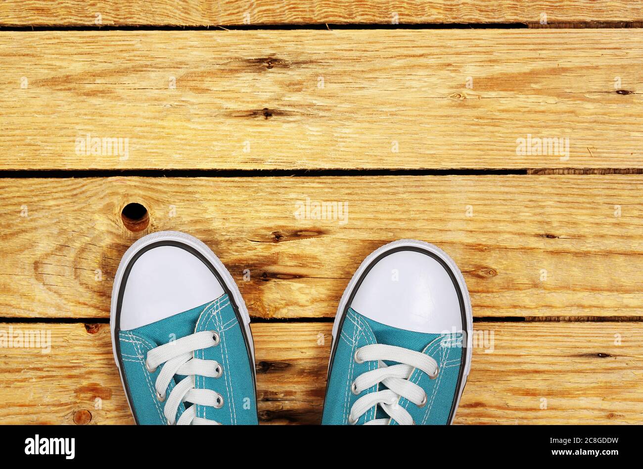 top view of sneakers on weathered wooden planks Stock Photo - Alamy