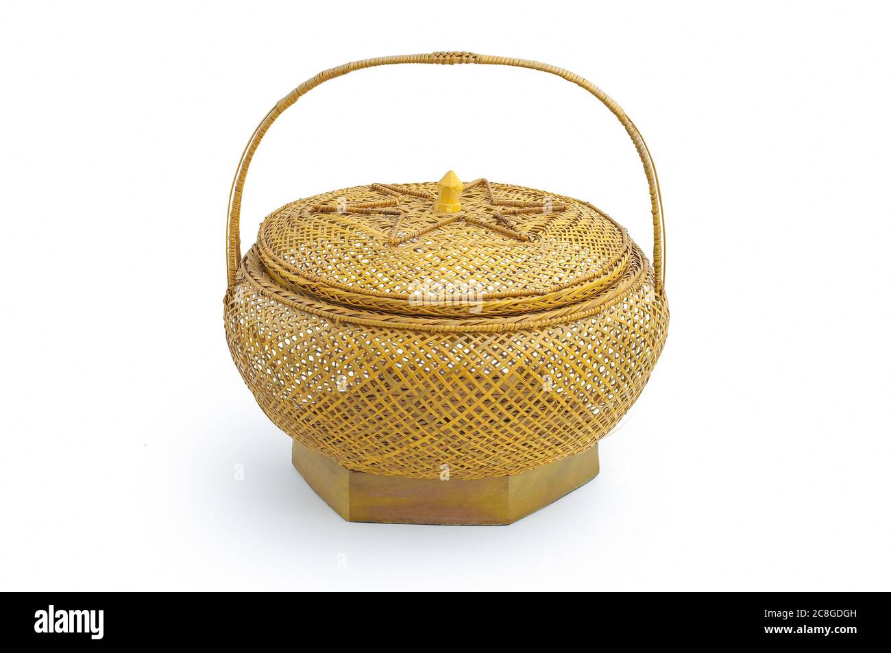 Traditional handicraft woven rattan wicker basket isolated on white ...