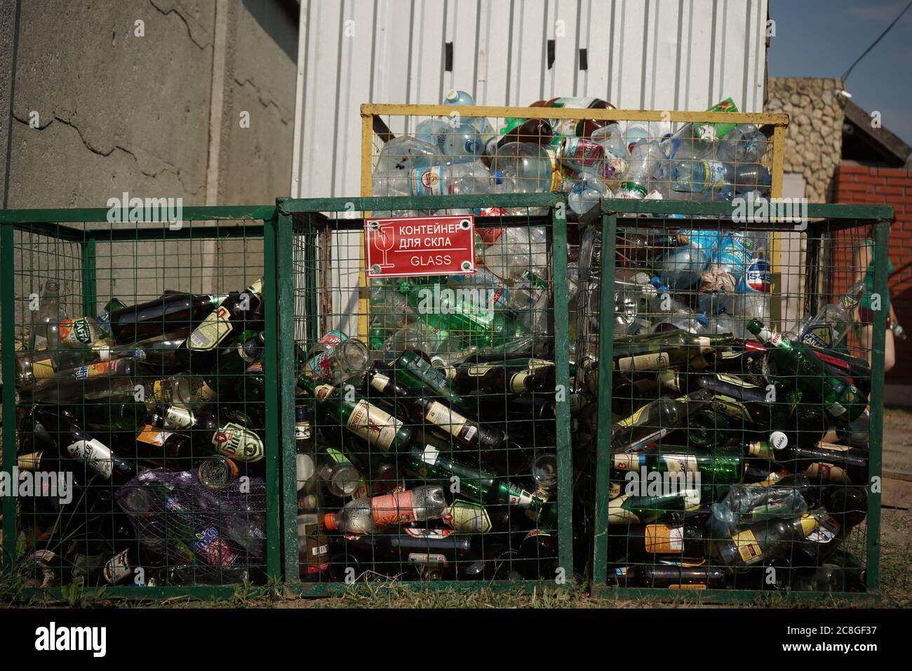 Clean environment concept. Glass and plastic bottles in different