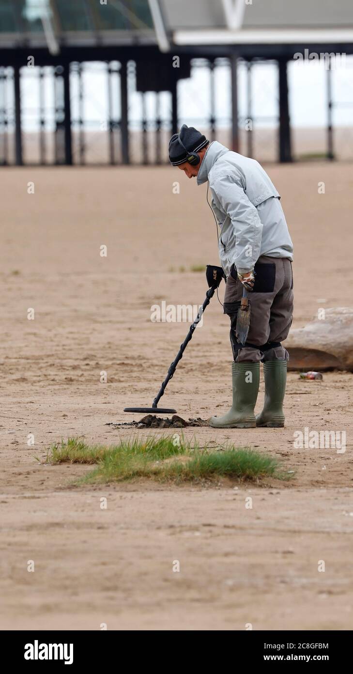 Man on Beach with Metal Detector Stock Photo Alamy
