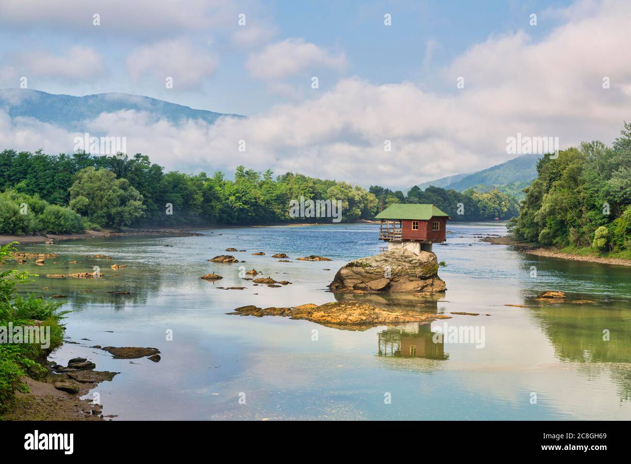 Wooden house on rocks in the river Drina, Banja Basta, Serbia Stock Photo