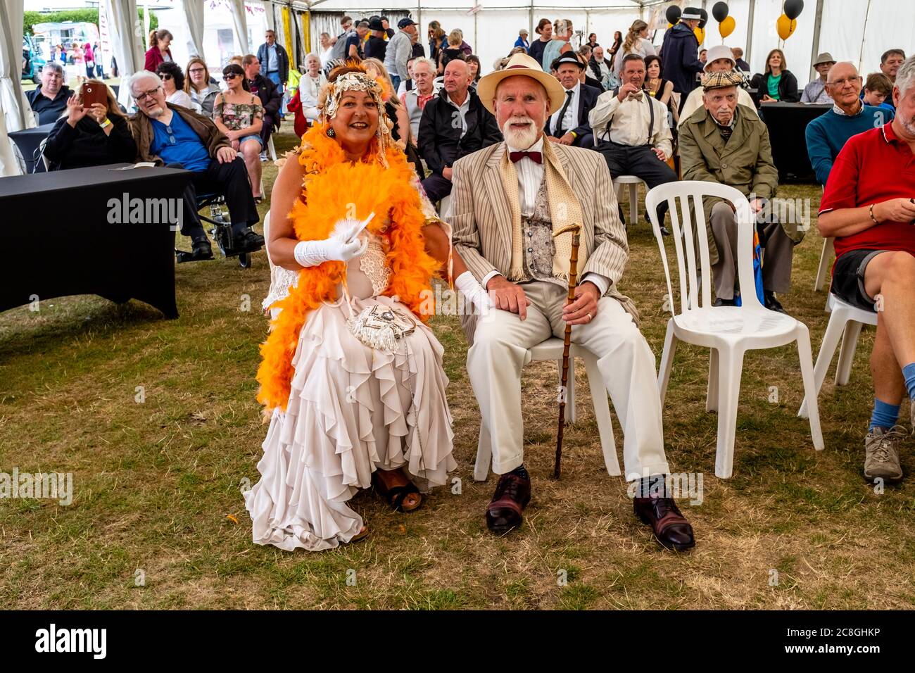 People Dressed In Period Costume At The Great Gatsby Fair, Bexhill on Sea, East Sussex, UK Stock Photo