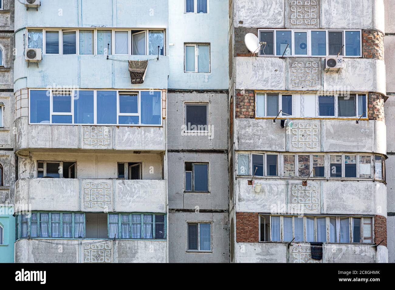 Ailing residential buildings, block of houses, house facade, Sandovoe, Moldova Stock Photo