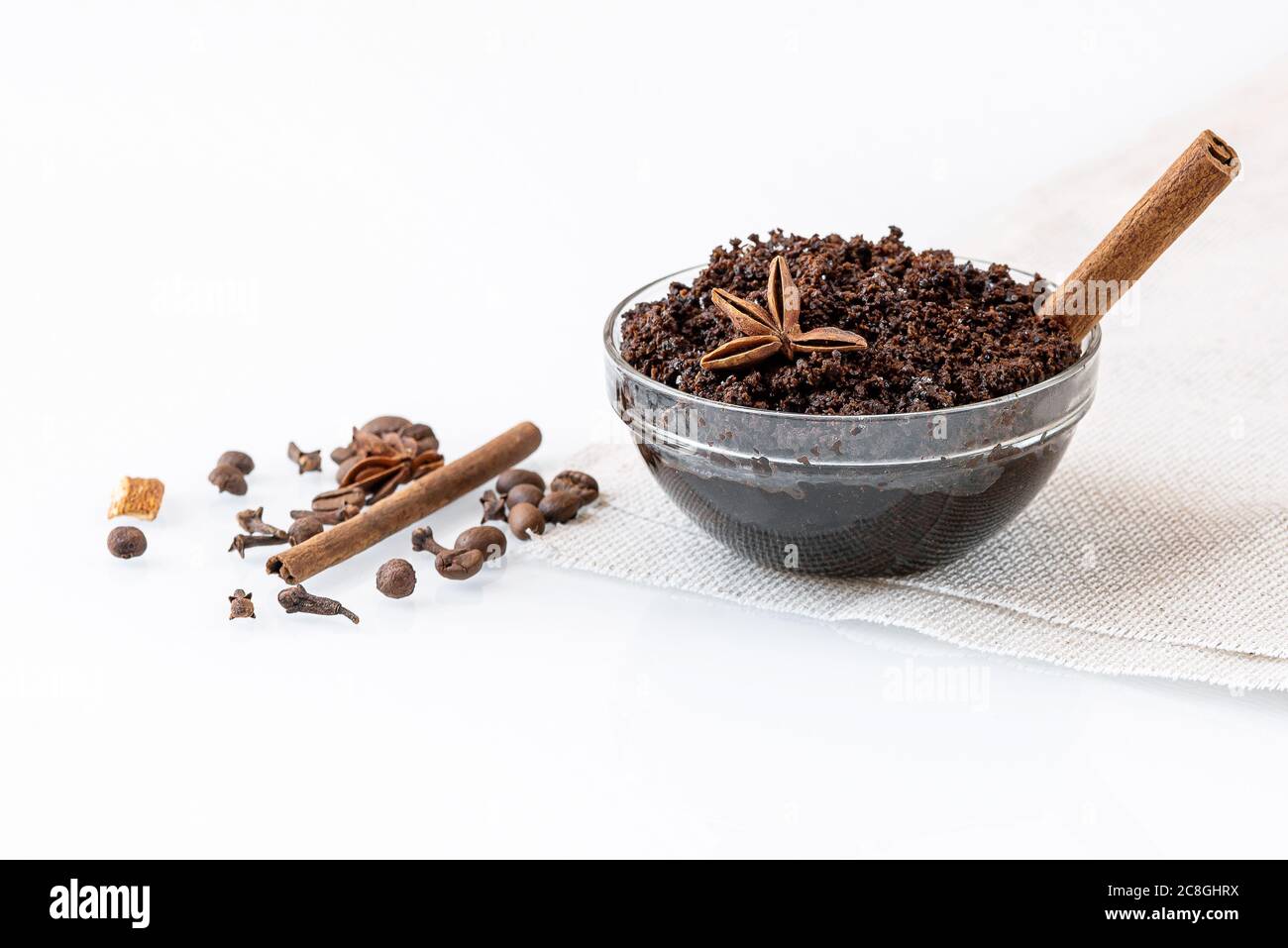 Homemade anticellulite scrub with ground natural coffee, cinnamon and