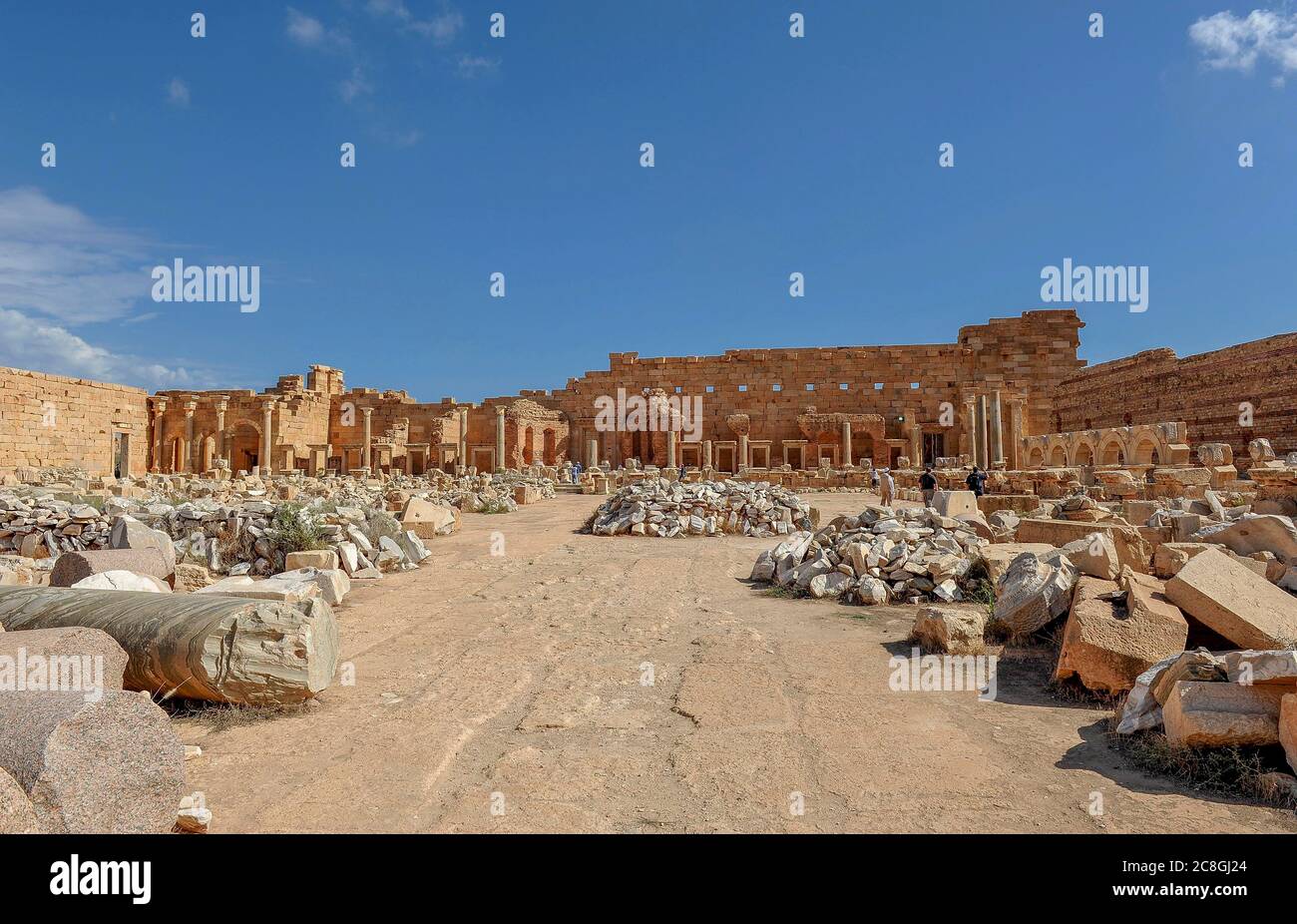 View of remains, square with stones and columns, new forum, ruined city Leptis Magna, Libya Stock Photo