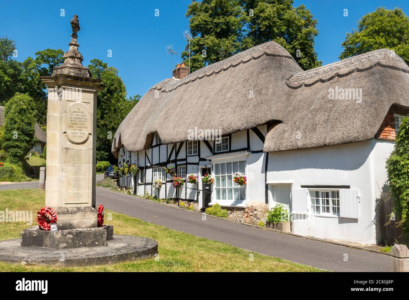 Pretty thatched cottages in the Hampshire village of Wherwell, England, UK, during summer Stock Photo