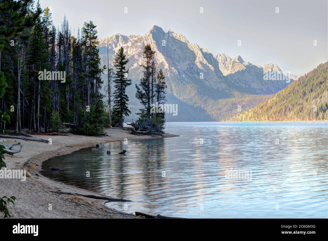 A daytime view of, Mount Heyburn reflected in the crystal clear waters