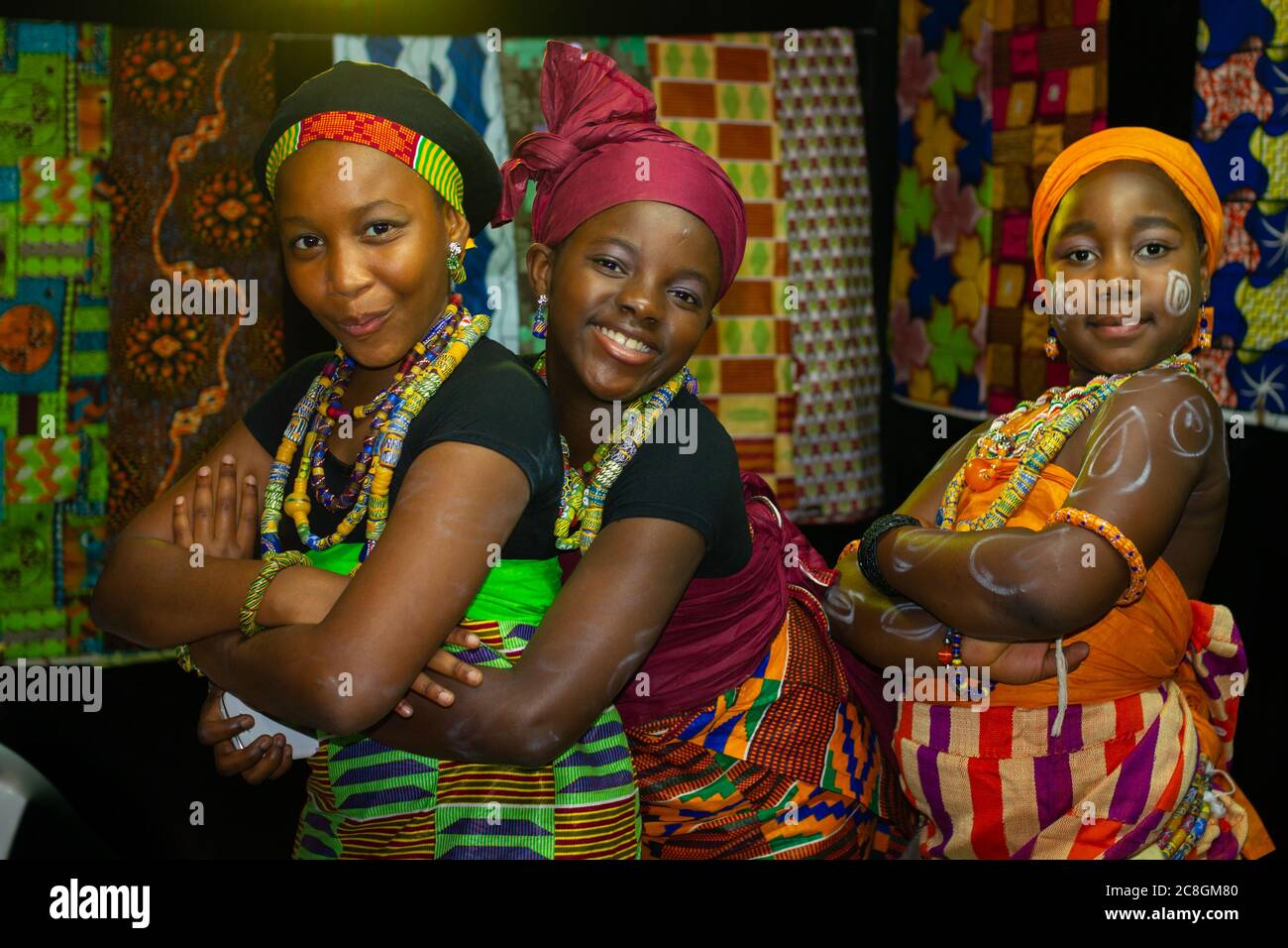 Portrait Of Three African Girls Wearing Traditional Tribe Costume With Portrait Of Three African Girls Wearing Traditional Tribe Costume With