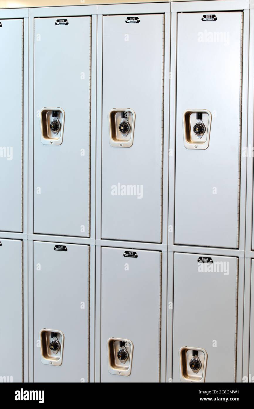 Rigby, Idaho, USA July 23, 2013 Lockers with combination locks, side by side in the hallway of a high school. Stock Photo