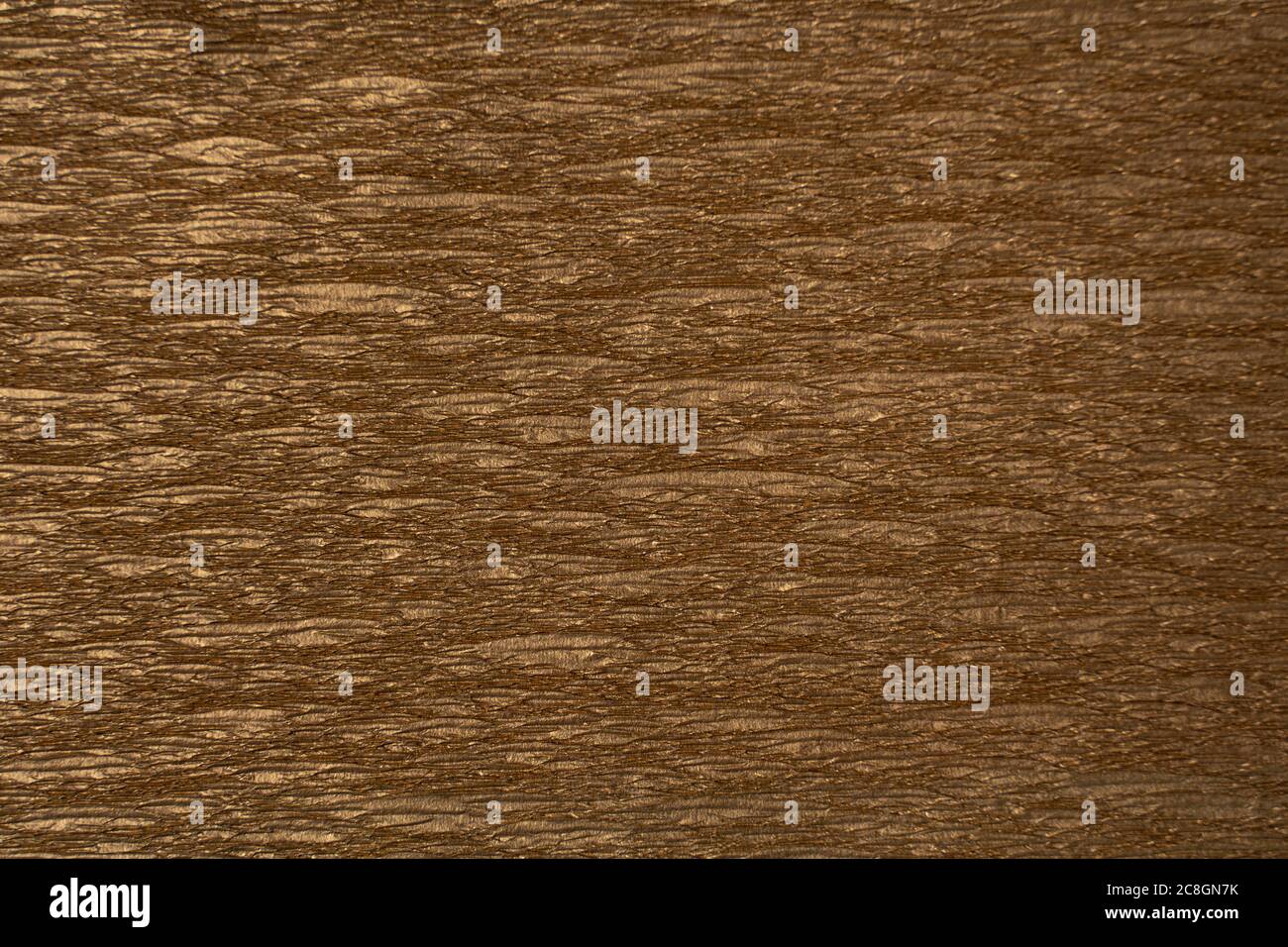 gold corrugated shiny background paper. paper texture Stock Photo