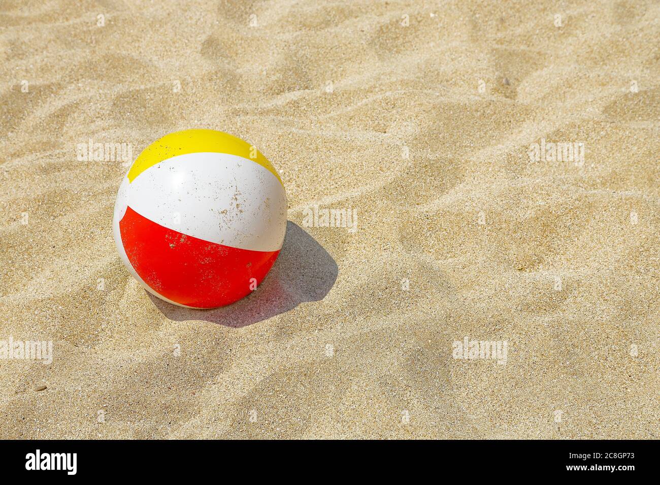 colorful plastic ball on the beach Stock Photo Alamy