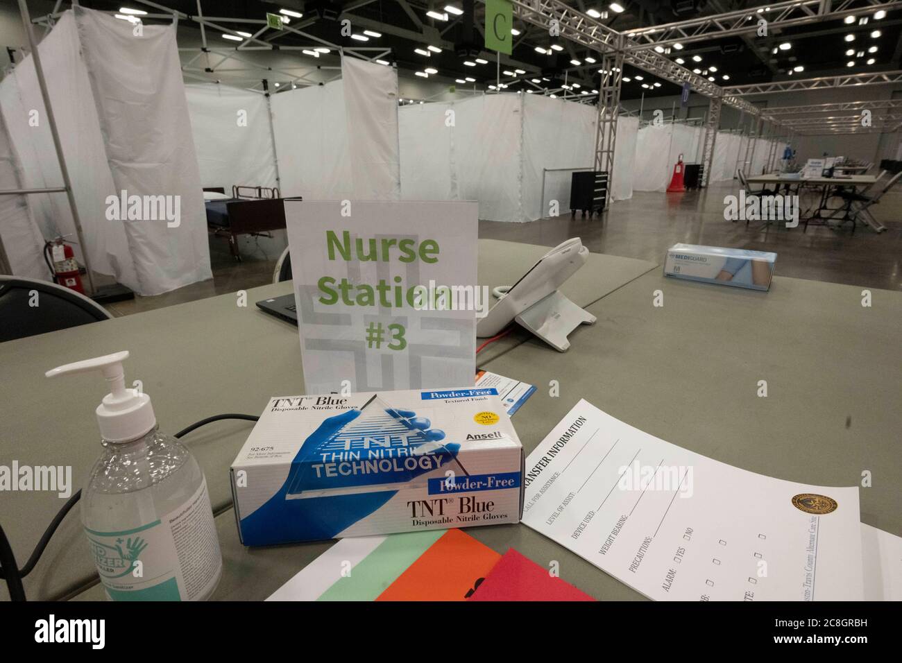 Austin, TX USA July 24, 2020: Nurse station at a field hospital in the Austin Convention Center as health officials expect a rush of COVID-19 patients as numbers of infected Texans continue to spike. The hospital is prepared to handle hundreds of mild to moderate cases that are overwhelming hospitals in the Rio Grande Valley. Credit: Bob Daemmrich/Alamy Live News Stock Photo