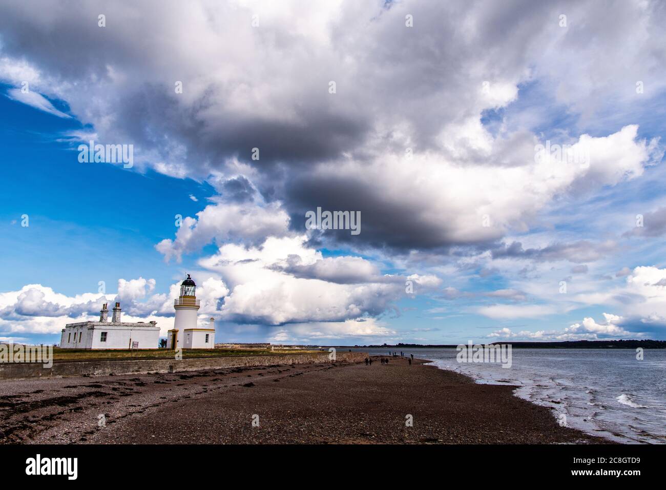 Beautiful view of the Chanonry point lighthouse in a little cloudy summer day. Stock Photo