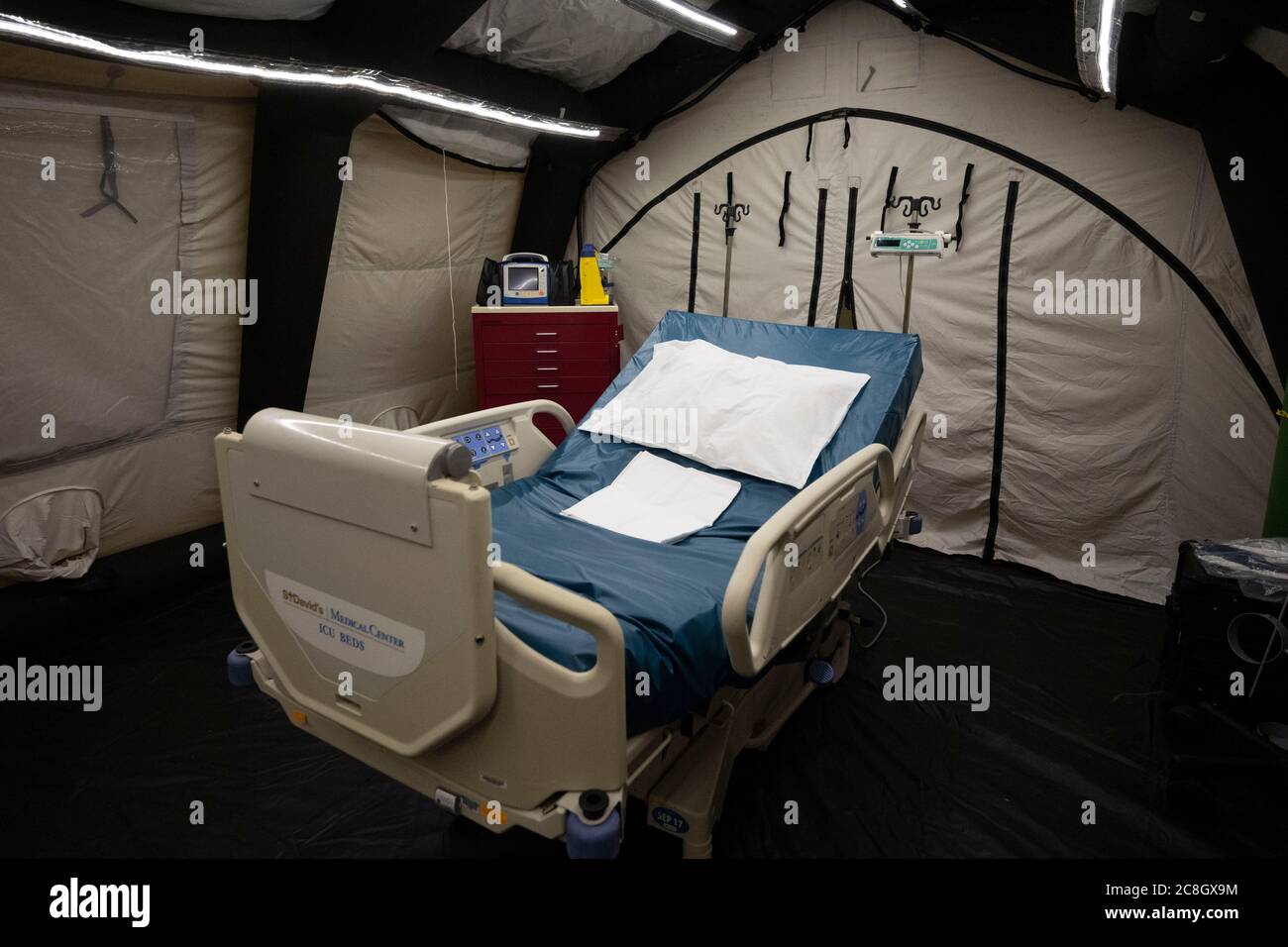 Austin, TX USA July 24, 2020: City officials prepare a field hospital, including this acute care unit, in the Austin Convention Center in anticipation of a rush of COVID-19 patients as numbers of infected Texans continue to spike. The hospital is prepared to handle hundreds of mild to moderate cases that are overwhelming hospitals in the Rio Grande Valley. Credit: Bob Daemmrich/Alamy Live News Stock Photo