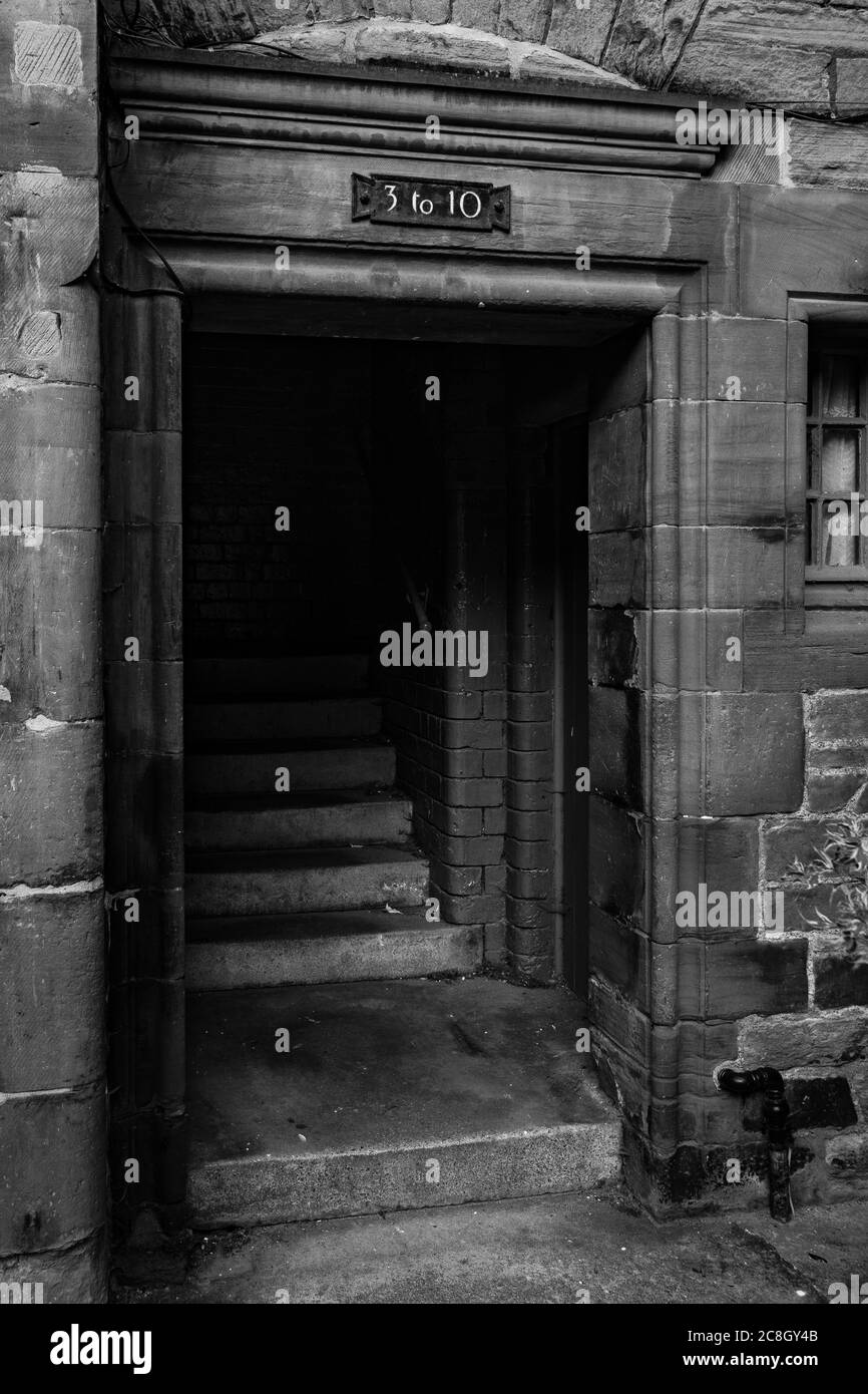 Beautiful glimpse in a vintage and traditional town of Edinburgh. Black and white perspective on Scottish corners. Stock Photo