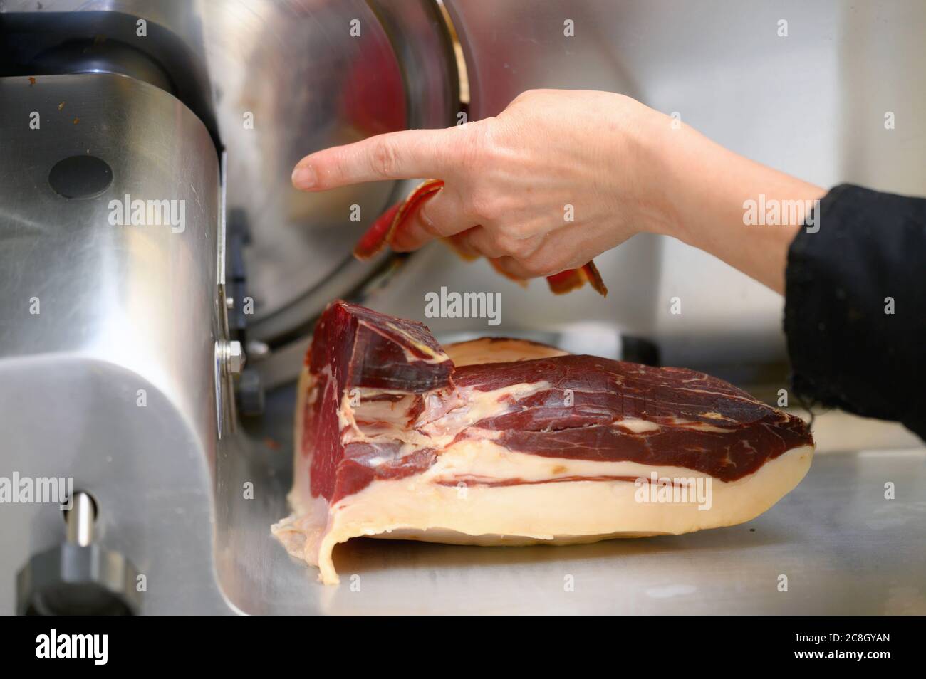 Salami and ham slicer on the sidewalk hi-res stock photography and images -  Alamy