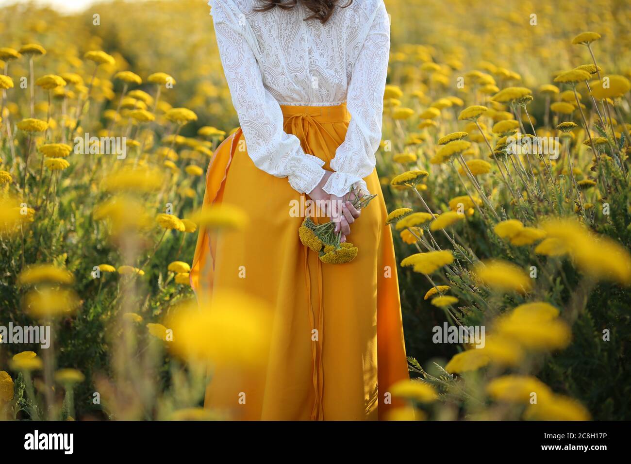 white blouse with yellow flowers