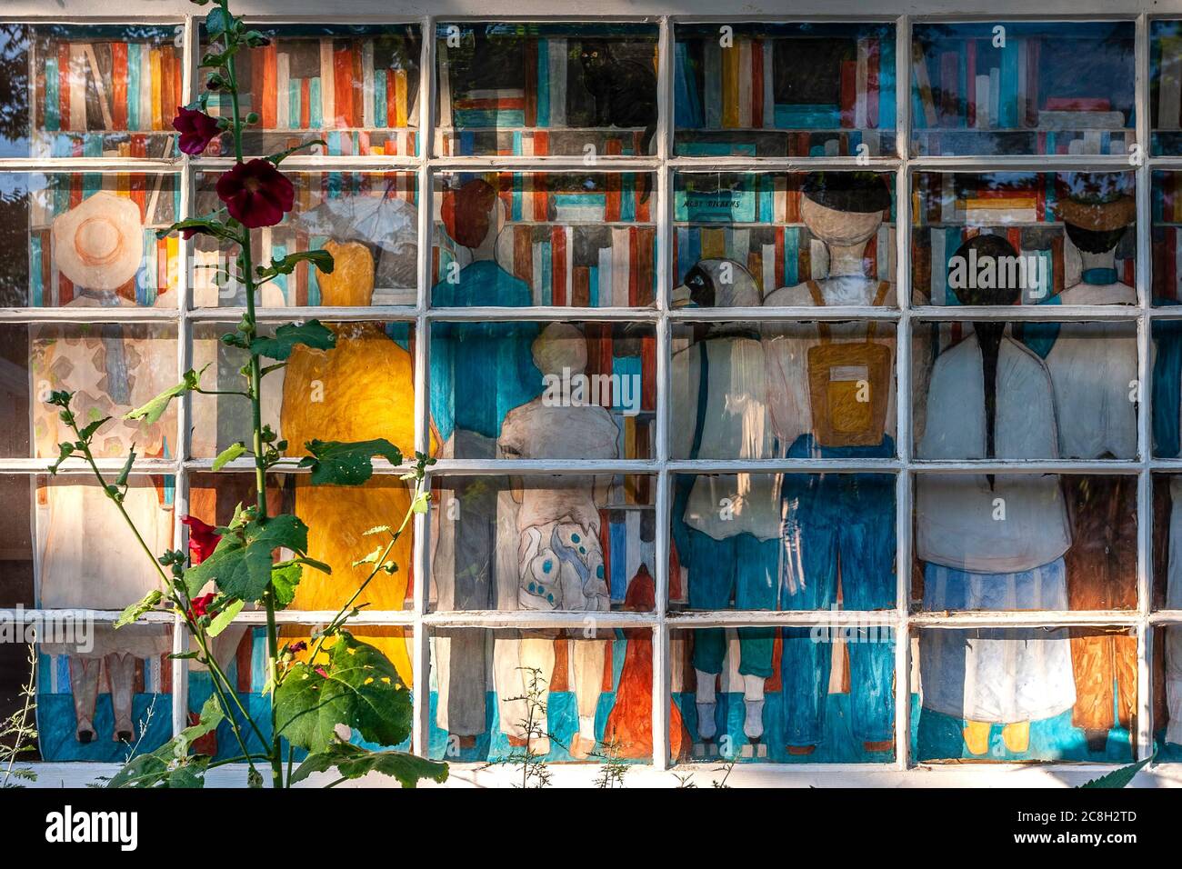 Grid window and "people", Moby Dickens Bookstore, Taos, New Mexico USA Stock Photo