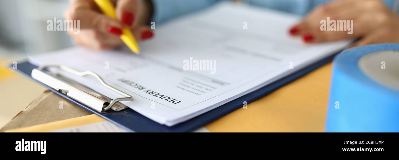 Holding clipboard pen red hi-res stock photography and images - Alamy