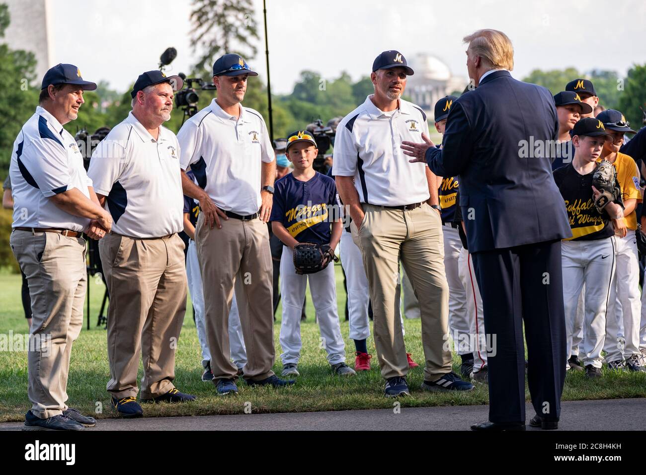 Washington, United States Of America. 23rd July, 2020. Washington, United States of America. 23 July, 2020. U.S. President Donald Trump chats with Little League players and coaches during a celebration to mark the opening day of Major League baseball on the South Lawn of the White House July 23, 2020 in Washington, DC The baseball season normally begins in the spring but was delayed due to the pandemic. Credit: Shealah Craighead/White House Photo/Alamy Live News Stock Photo
