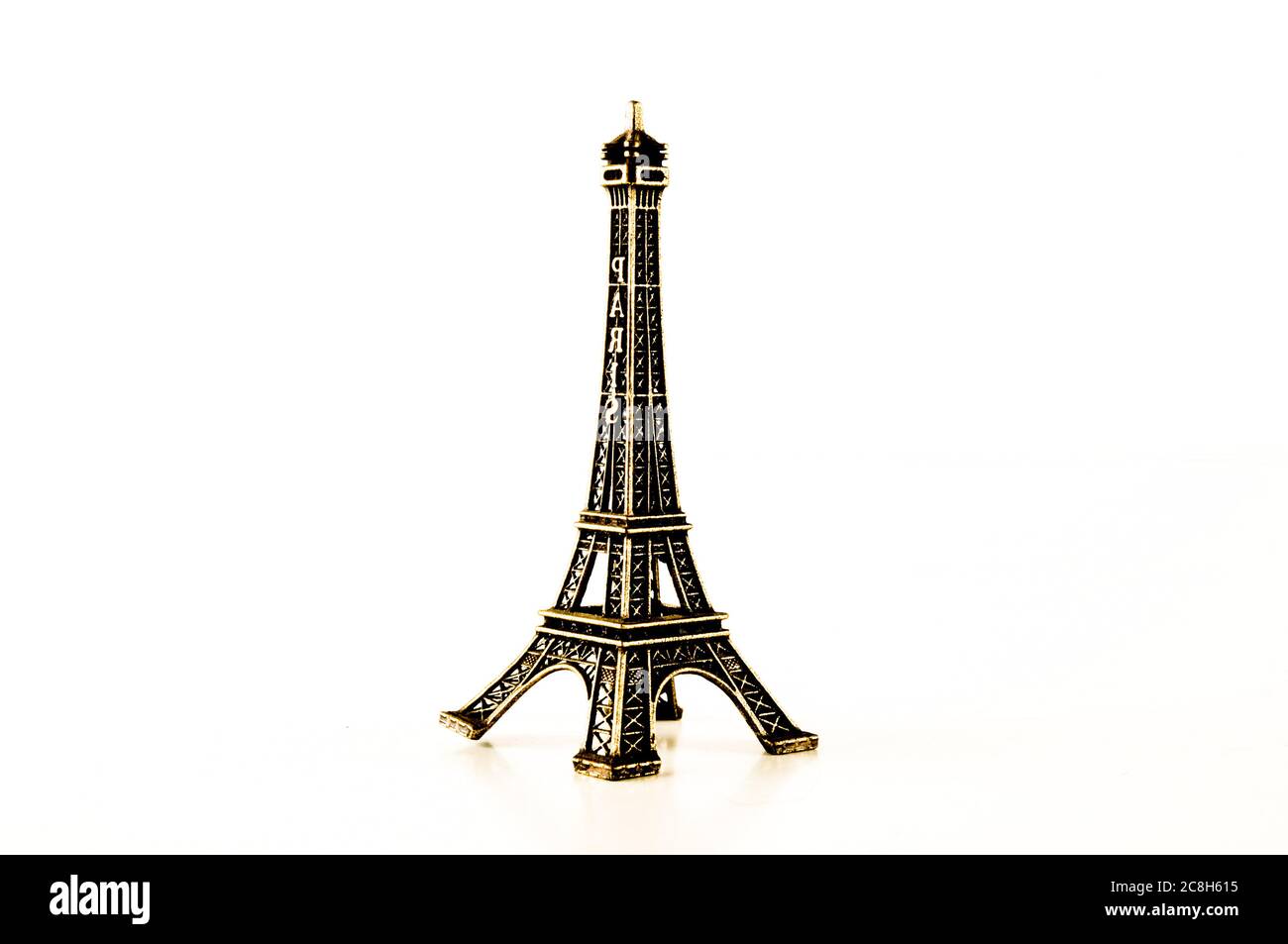 Eiffel Tower toy miniature on white background Stock Photo - Alamy