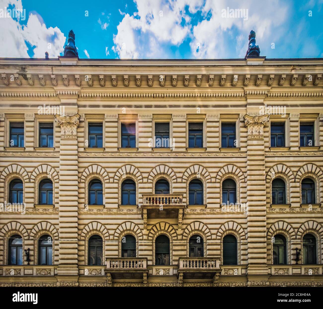 Budapest, Hungary, AUG 2019, view of the upper part of a building with architectural sculpture Stock Photo