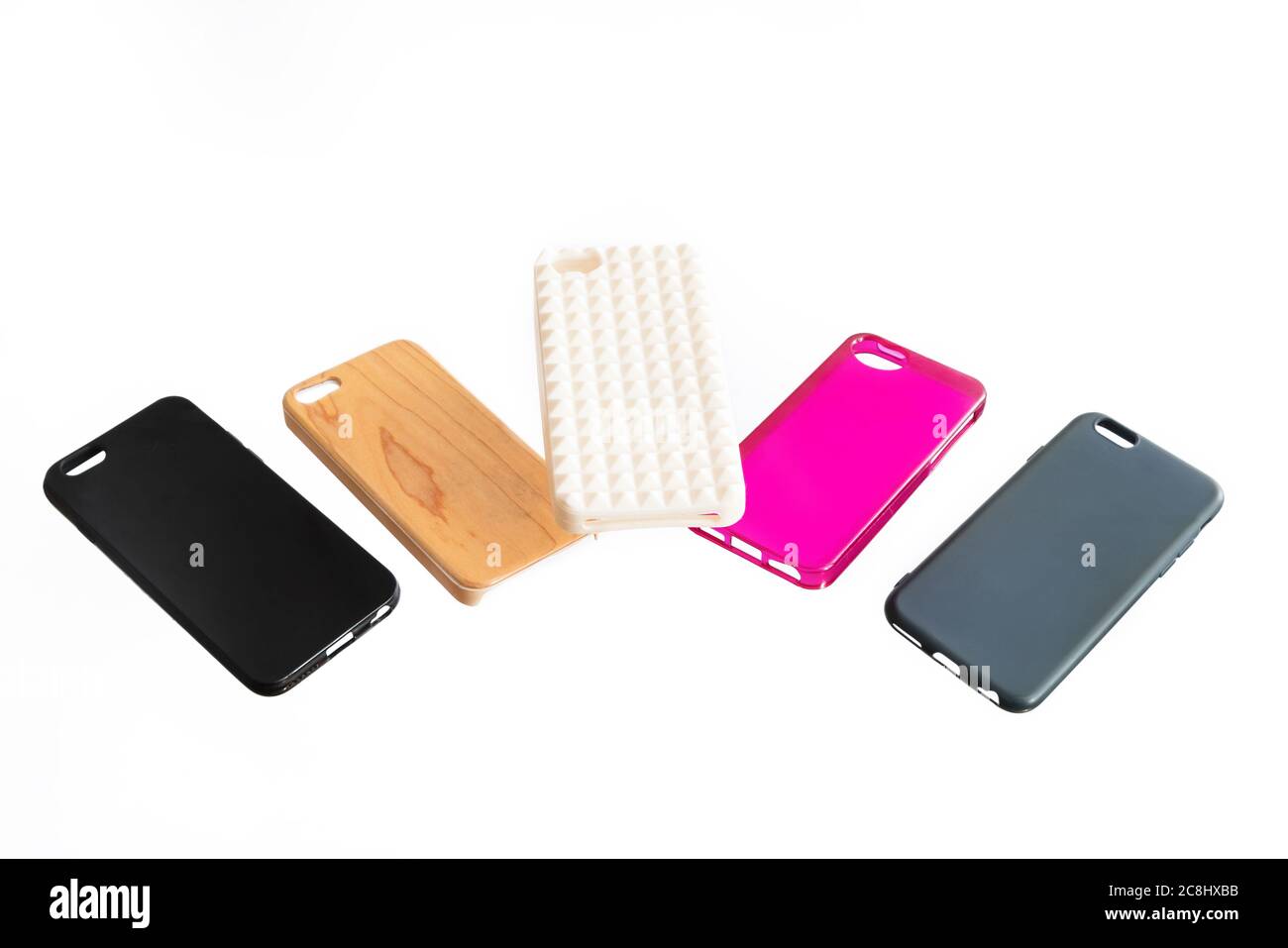 Pile of multicolored plastic back covers for mobile phone levitating on