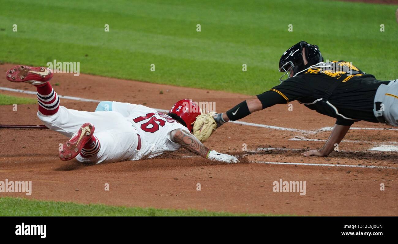 St. Louis, United States. 24th July, 2020. St. Louis Cardinals Kolton Wong is tagged out at home plate by Pittsburgh Pirates catcher Jacob Stallings in the fifth inning at Busch Stadium in St. Louis on Friday, July 24, 2020. Photo by Bill Greenblatt/UPI Credit: UPI/Alamy Live News Stock Photo