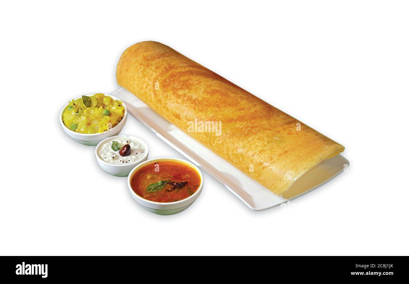 Group of South Indian food like Paper Masala Dosa (dhosa), Idli or idly, Wada or vada (Medu Vada), sambhar, sambar and coconut chutney, white backgrou Stock Photo