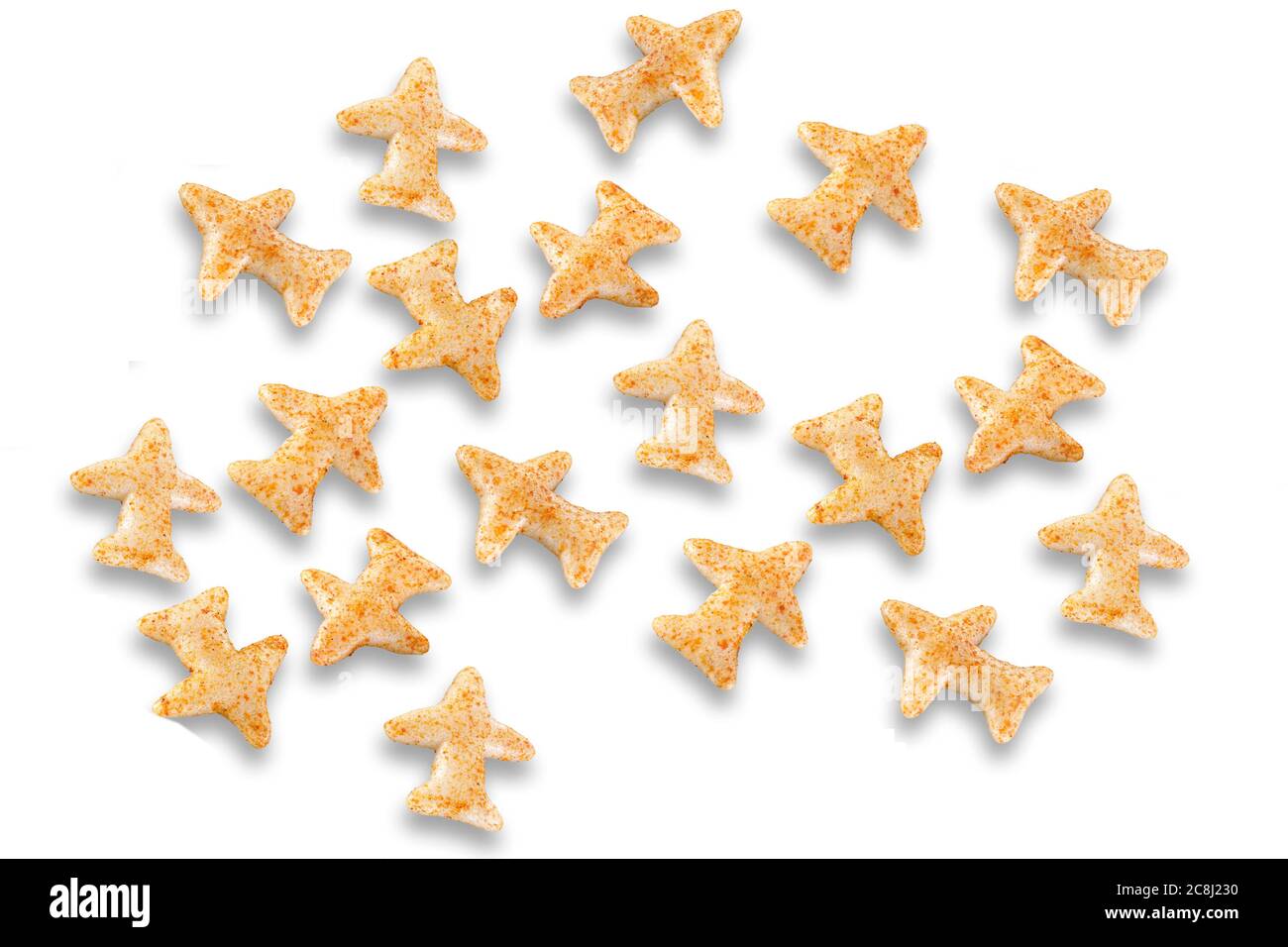 Fried and Spicy Aero Plane Snacks or Fryums (Snacks Pellets) served in a bowl or White background. selective focus - Image Stock Photo