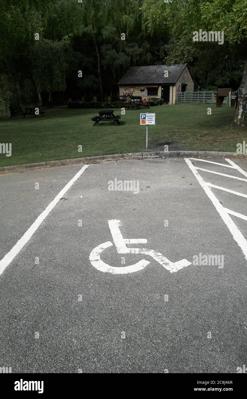 Parking space reserved for a handicapped person. Stock Photo