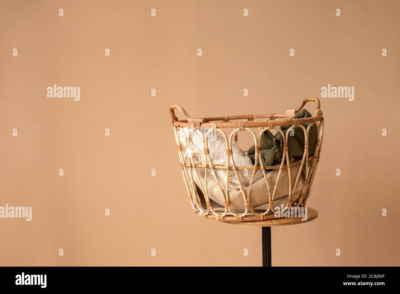 Warm blankets placed in basket Stock Photo