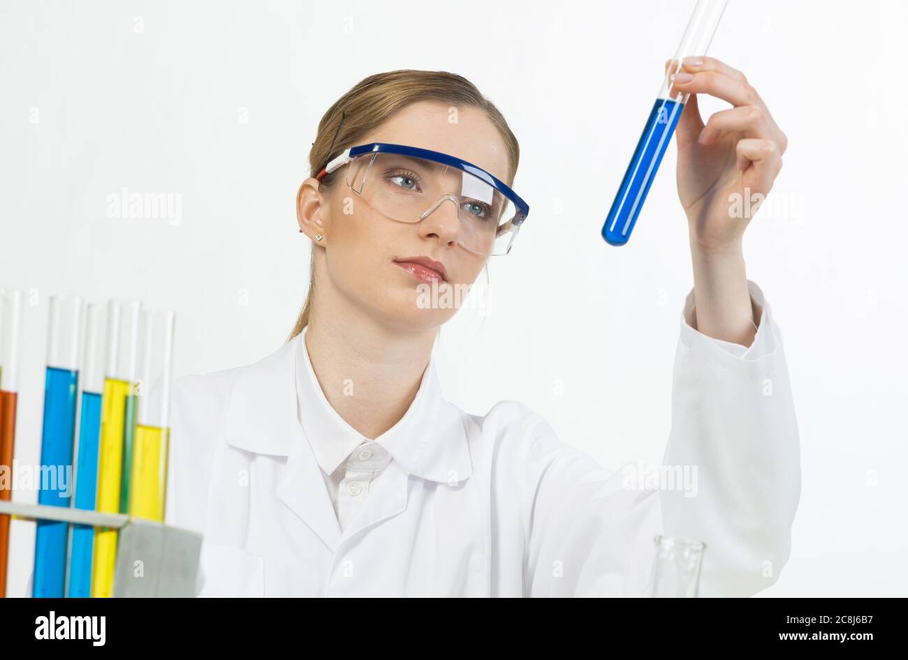 Laboratory assistant conducts experiment concept Stock Photo Alamy