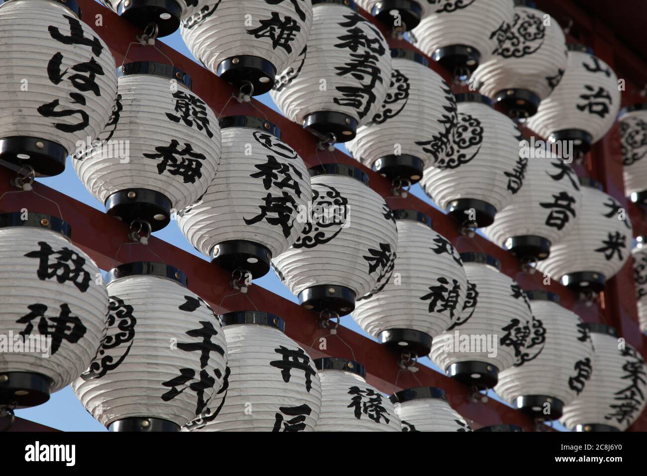 Rows of white lanterns at a Japanese Temple in Tokyo Stock Photo