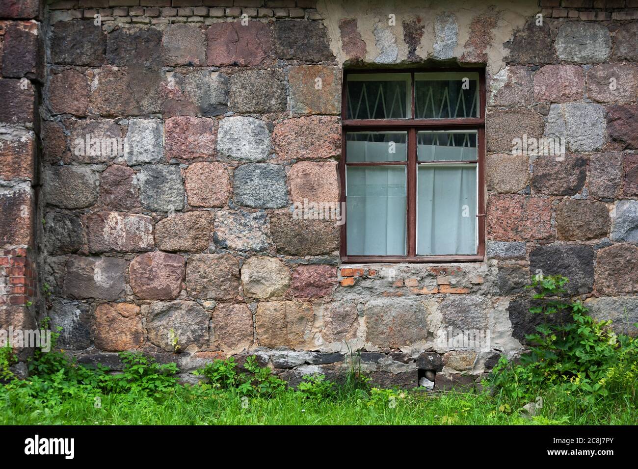 Window in old stone wall Stock Photo - Alamy
