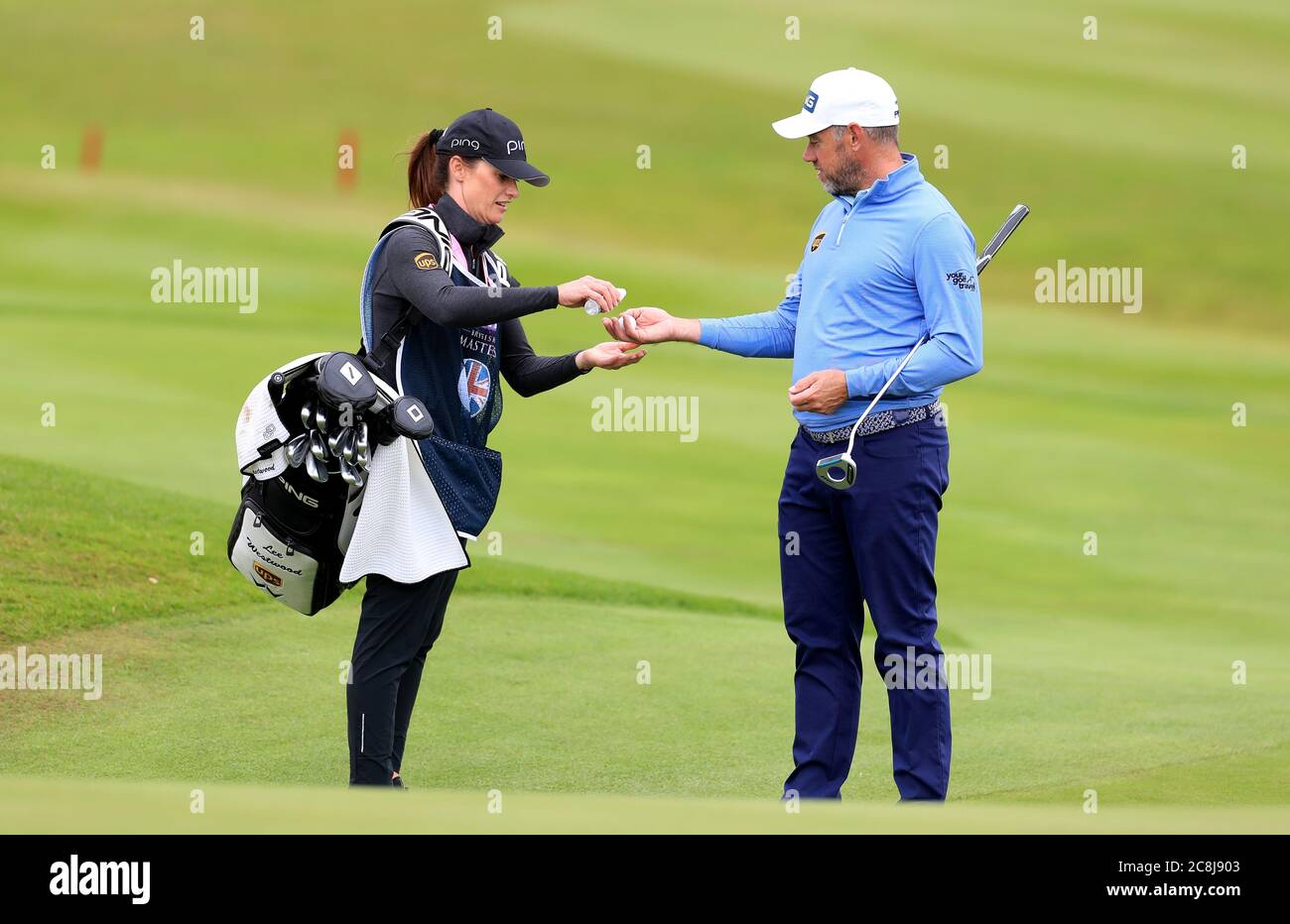 Lee Westwood And Girlfriend Caddy Helen Storey Use Hand Sanitiser On The Eighth Hole During Day Four Of The Betfred British Masters At Close House Golf Club Newcastle Stock Photo Alamy