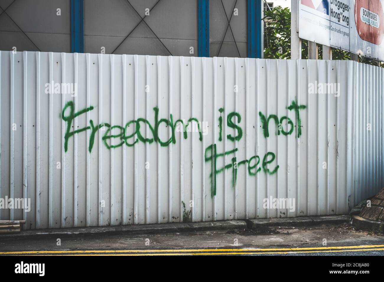 HongKong - November, 2019: Political graffiti saying, Freedom is not free, during the Hong Kong protests, a series of demonstrations in Hongkong Stock Photo