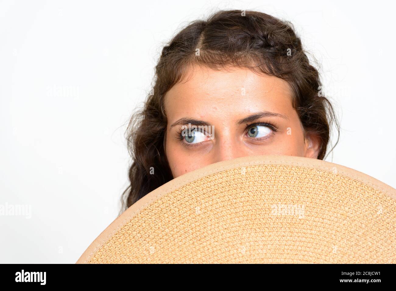 Portrait of young beautiful tourist woman with curly hair Stock Photo ...