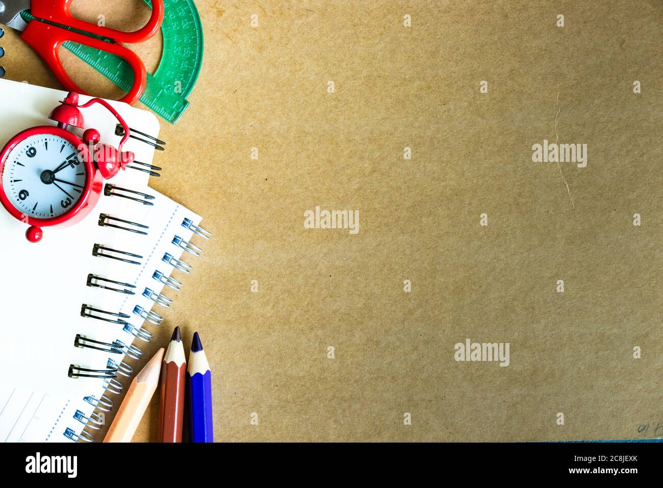 Back to School flatlay on crafted paper background with copy space Stock Photo