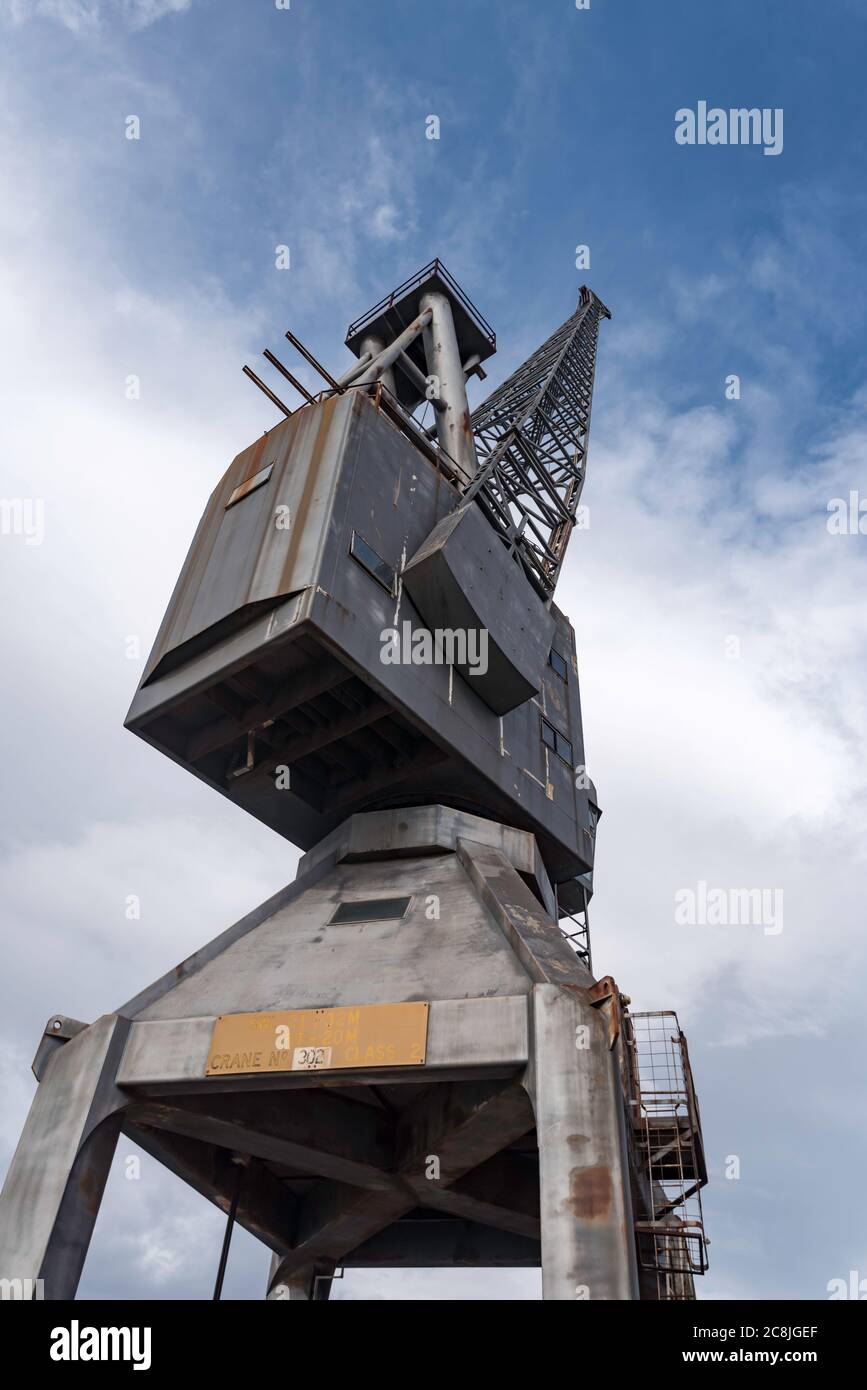 A now disused but preserved, dockside cantilevered crane on Cockatoo Island in Sydney Harbour, Australia Stock Photo