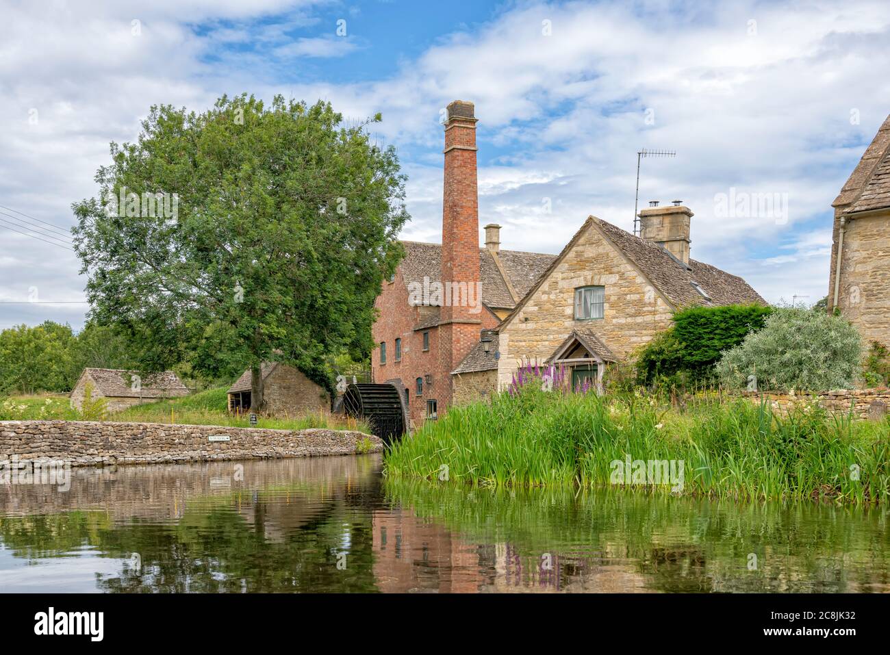 The Old Mill on the River Eye in Lower Slaughter, The Cotswolds, Gloucestershire, United Kingdom Stock Photo